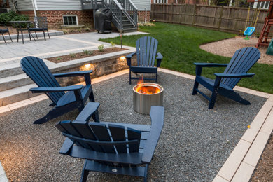 This is an example of a contemporary landscaping in DC Metro with a fire pit.