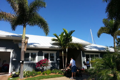 Photo of a beach style home design in Miami.