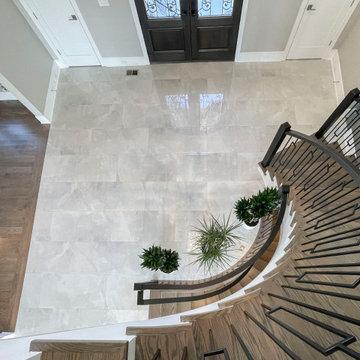 Project #114 | Freestanding Curved Foyer Staircase