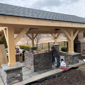 Outdoor pavilion with fireplace