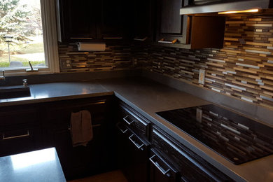 Example of a minimalist kitchen design in Other