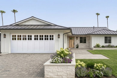 Example of a beach style home design design in Orange County