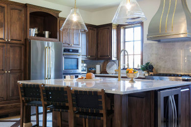 Large transitional eat-in kitchen photo in Austin with a farmhouse sink, shaker cabinets, dark wood cabinets, quartz countertops, multicolored backsplash, quartz backsplash, stainless steel appliances, an island and white countertops