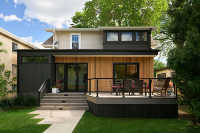Inspiration for a small contemporary one-story wood exterior home remodel in Minneapolis