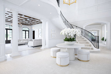 Example of an island style home design design in Miami