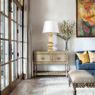 Ejemplo de salón para visitas abierto, mediterráneo, grande, sin televisor, con chimenea de doble cara