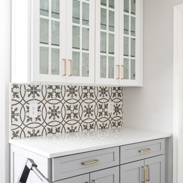 Butlers pantry with cement tile backsplash