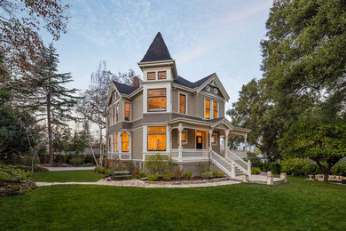 Mid-sized ornate beige two-story vinyl exterior home photo in San Francisco
