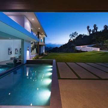 Benedict Canyon Beverly Hills luxury home modern indoor outdoor entry pond