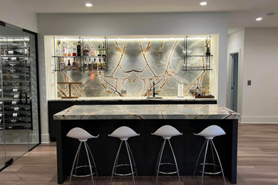 Example of a transitional home bar design in Atlanta