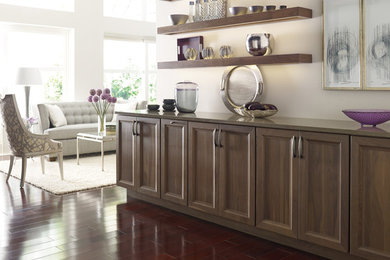Mid-sized transitional dark wood floor kitchen photo in Other with recessed-panel cabinets, medium tone wood cabinets and stainless steel appliances