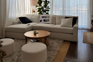 Living room - small scandinavian enclosed living room idea in Los Angeles with white walls