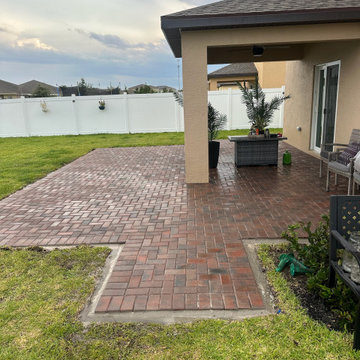 Covered Backyard Paver Patio Installation | Treasure Coast Outdoor Living