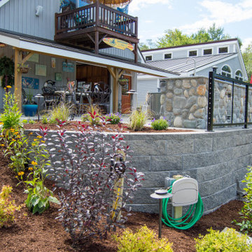 Outdoor Kitchen, Firepit, Patio, Stairs, Retaining Wall and Flowerbeds
