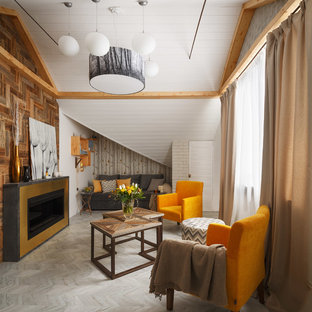 Inredning av ett modernt separat vardagsrum, med vita väggar, korkgolv, en spiselkrans i metall, grått golv och en standard öppen spis