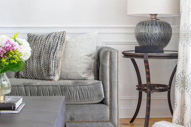 Example of a transitional living room design in New York