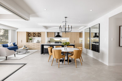 This is an example of a contemporary dining room in Brisbane.