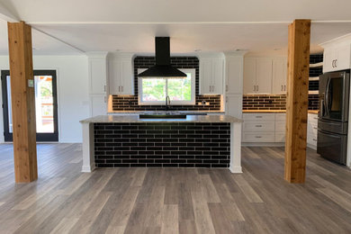 Example of an arts and crafts kitchen design in Atlanta