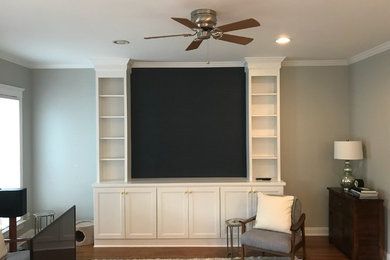 Elegant family room photo in Raleigh