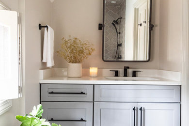 Photo of a medium sized country ensuite bathroom in Boston with grey cabinets, beige walls, ceramic flooring, quartz worktops, white floors, white worktops, a single sink and a built in vanity unit.