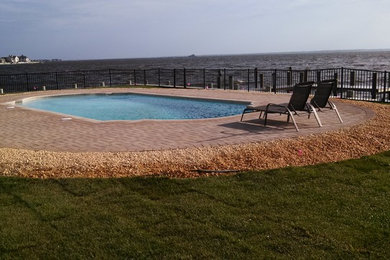 Inspiration for a coastal pool remodel in New York