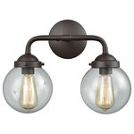 Elk Home - Beckett 2-Light for The Bath, Oil Rubbed Bronze With Clear Glass - Two light oil rubbed bronze bath vanity with clear glass. Can be hung with glass facing up or down. Two 60 watt medium base incandescent or led bulb required, not included. Pictured with filament style bulb, not included.