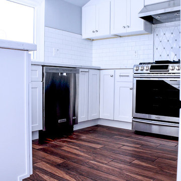 Shaker White Kitchen with porcelain wood tile floor