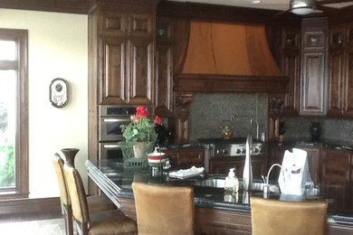 Kitchen - traditional kitchen idea in Other