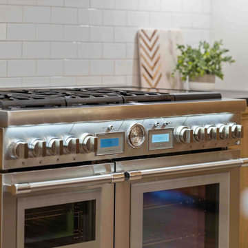 Luxurious Modern Farmhouse Kitchen: Oversized Marble Island, Pro Appliances, and