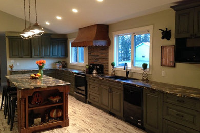 Inspiration for a large country l-shaped vinyl floor kitchen pantry remodel in Calgary with a drop-in sink, raised-panel cabinets, green cabinets, laminate countertops, multicolored backsplash, mosaic tile backsplash, black appliances and an island