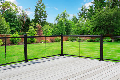 Cable Railing with powder-coated aluminum posts, handrails and foot rails.