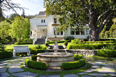 Inspiration for a large contemporary partial sun courtyard stone landscaping in San Francisco for spring.