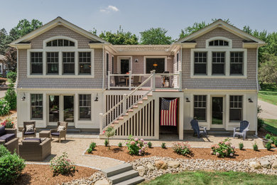 Mid-sized coastal gray two-story wood and shingle exterior home idea in Bridgeport with a shingle roof and a brown roof