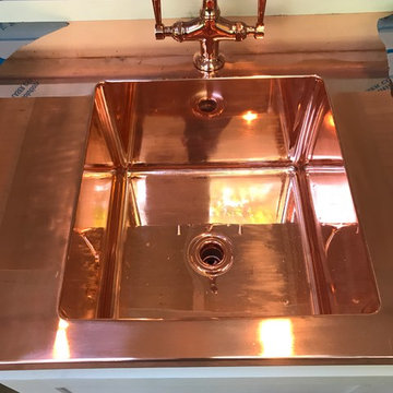 That's actually a mirror polished copper counter with a custom sink welded in...