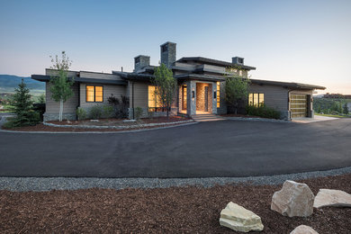 Mid-sized contemporary beige two-story mixed siding flat roof idea in Salt Lake City