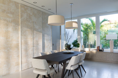 Example of a trendy dining room design in Miami