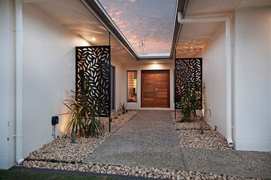 Design ideas for a contemporary entryway in Townsville.
