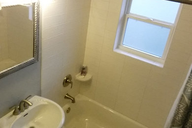 Inspiration for a small contemporary master white tile and subway tile porcelain tile and gray floor alcove bathtub remodel in Oklahoma City with a two-piece toilet, gray walls and a pedestal sink