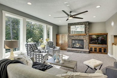Transitional carpeted living room photo in Minneapolis with a standard fireplace and a stone fireplace