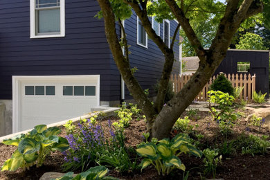 Inspiration for a mid-sized traditional drought-tolerant and full sun front yard stone garden path in Seattle for summer.