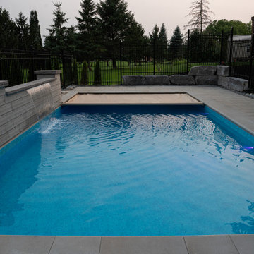 Rectangular Pool with Sheer Descent Water Wall & Automatic Safety Cover