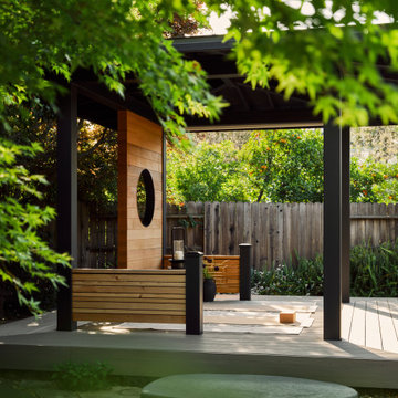 Contemporary Tea House Pavilion in Lush Backyard Garden