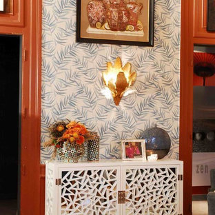 Inspiration for an expansive mediterranean open plan living room in Orange County with blue walls, medium hardwood flooring and a plastered fireplace surround.