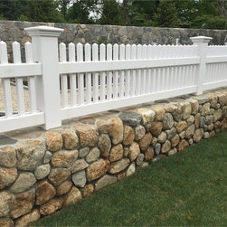 2' Solid Stain 'White' Cape Cod fence on a garden wall - Products