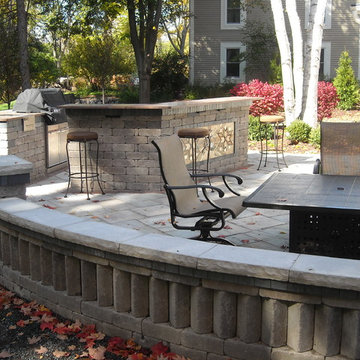 Outdoor Living Area with Kitchen and Pond