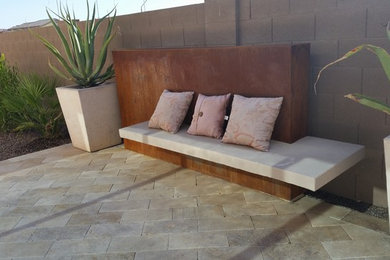 Photo of a mid-sized modern backyard landscaping in Phoenix.
