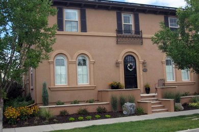 This is an example of a mediterranean front yard garden in Denver.