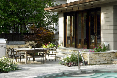 Large traditional gray two-story wood house exterior idea in Chicago with a gambrel roof and a mixed material roof