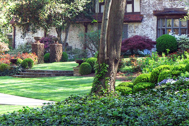 Photo of a large transitional partial sun side yard garden path in Atlanta.