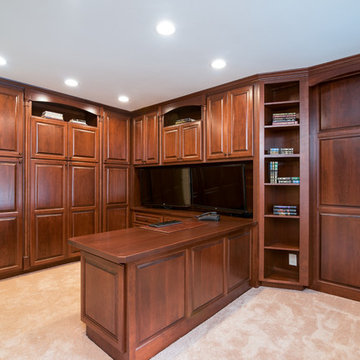 Custom Office with Cherry Raised Panel Doors and Wood Countertops